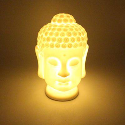 China High Quality Ceramic Home Ceramic Statue Buddha Head Decoration Porcelain Ornaments White Figurine With LED Lamp for sale