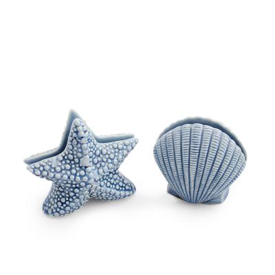 China Sustainable Wholesale Starfish Shell Shape Ceramic Restaurant High Grade Napkin Holder for sale