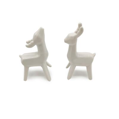 China Handmade White Ceramic Handwork Ornament Porcelain Reindeer Figurine For Christmas Decorations for sale