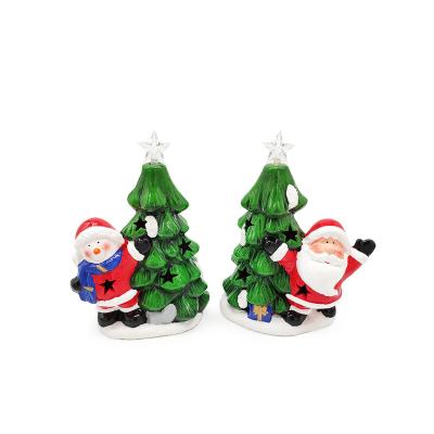 China Handmade Terracotta Santa Claus Snowman Decorative Ceramic Figurine with Christmas Tree LED Light for sale