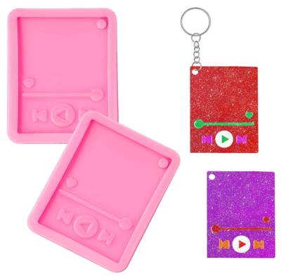 China Reusable Glossy Shiny Epoxy Craft Media Player Resin Silicone Key Chain Molds for sale