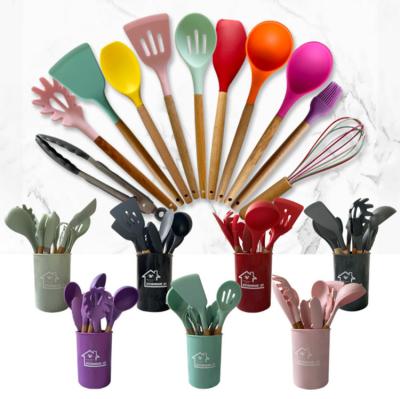 China Eco-friendly 12 Pieces Silicone Kitchen Accessories Cooking Tools Kitchenware Silicone Kitchen Utensils With Wooden Handles for sale