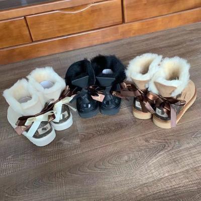 China High quality wholesale round most popular hot kids and girls design winter fashion women snow boots for sale