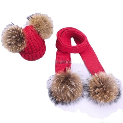 China COMMON children's two wool ball wool hat scarf set men's and women's raccoon fur pompom wool ball knitted ear set thickened wholesale for sale