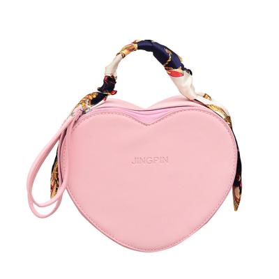 China 2021 newest high quality simple images lady fashion lady heart handbag mini sellers for sale