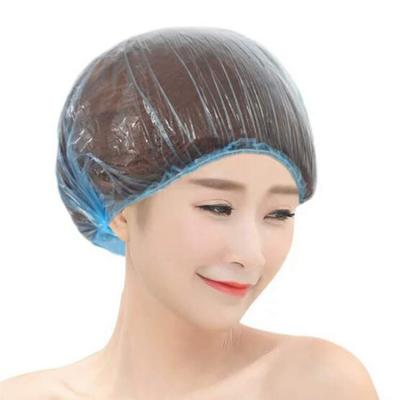 China Durable Disposable PE Tape Plastic Shower Cap For Hotel for sale