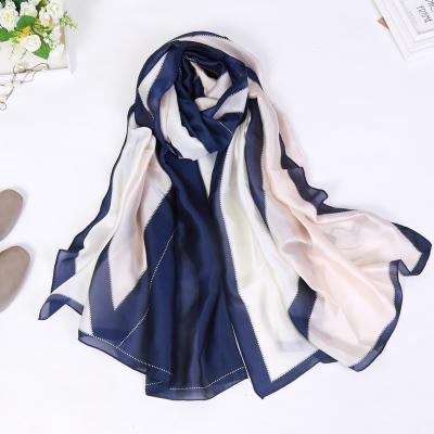 China New arrival 180*90cm long version shawl Korean version feeling silk scarf wholesale elegant luxury soft smooth ice silk scarf for lady for sale