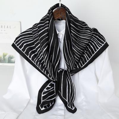 China Hot Selling Luxury Elegant Soft Feeling Muslim Shawl Printed 90*90cm Women's Scarf Simple And Elegant Santi Silk Head Wrap Hair Scarf For Women Wholesale for sale