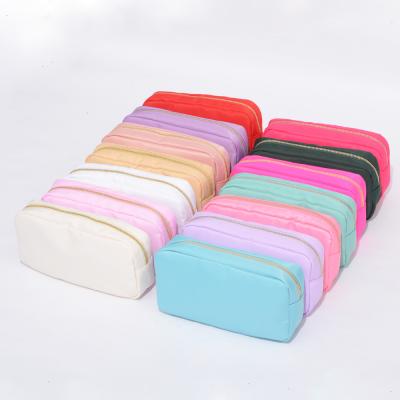 China Waterproof Luminous Color Pocket Nylon Cloth Toiletry Bag Customized Cute Makeup Cosmetic Bag And Cases for sale