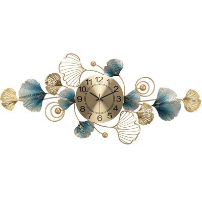 China Creative Metal Style Leaf Ginkgo Ornament Wall Clock Simple Fashion Household Living Room Antique Luxury Art Clock for sale