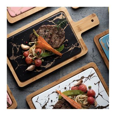 China Stocked European Style Kitchen Restaurant Dish Rectangle Marble Texture Ceramic Steak Dish With Wooden Stand for sale