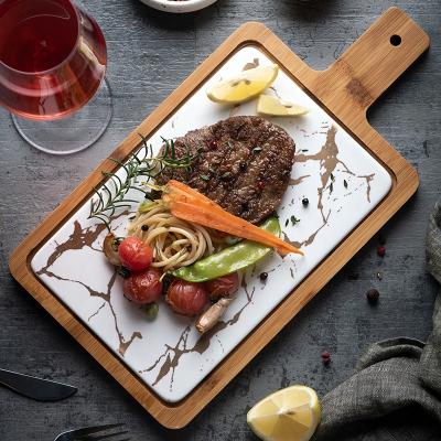 China Stocked Western Style Porcelain Dessert Dish Black White Square Ceramic Steak Dish With Wood Tray for sale