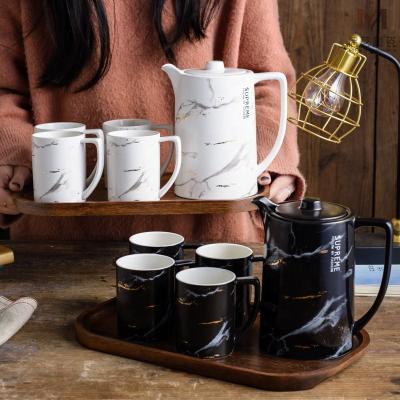 China Wholesale Nordic Marble Pattern Hotel Stocked Ceramic Black Home Tea Cup Set With Wooden Tray for sale