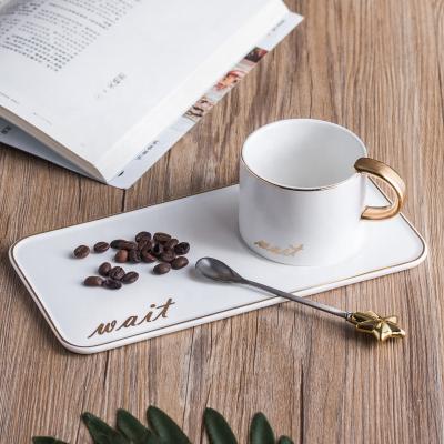 China Nordic style cup and saucer English alphabet creative stocked ceramic cup with gold office business coffee cup for sale