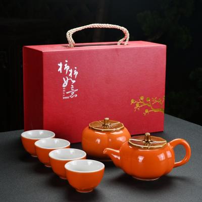 China New Designs Stocked 7 Pieces Orange Shaped UK Persimmon-Kiln Porcelain Teapot Cup Chinese Kungfu Tea Set for sale