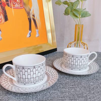 China Nordic Luxury Stocked Bone China Tea Cups And Saucers Set Ceramic Afternoon Tea Coffee Cup Set for sale