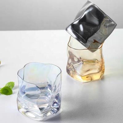 China Viable Wholesale Special Drinkware Deep Weighed Beer Bottom Whiskey Coffee Tea Irregular Shaped Glass Mug With Gold Rim for sale