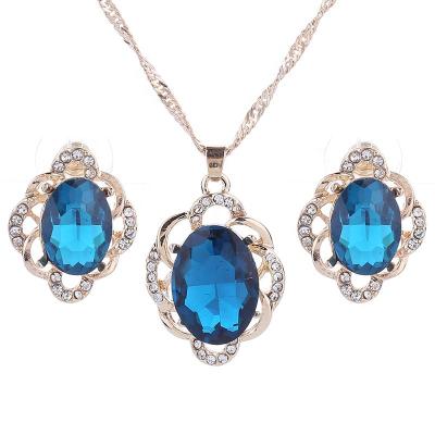 China Luxury Durable Designs Gold Jewelry Set Women Diamond Big Gemstones Drop Pendant Earrings Necklaces Set for sale