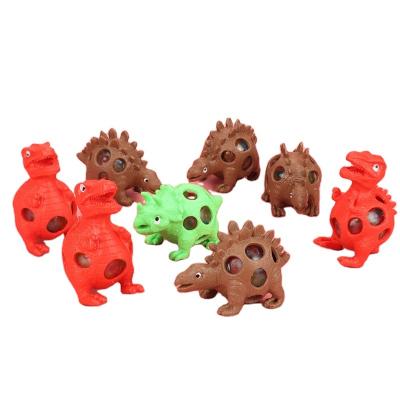 China Creative Tricky Emotion Driven Dinosaur Pinch Music Dinosaur Grape Ball Dinosaur New Children Play for sale