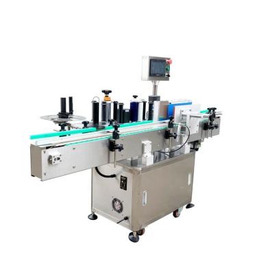 China 304SS Professional Automatic Food Adhesive Sticker Round Bottle Labeling Machine for sale