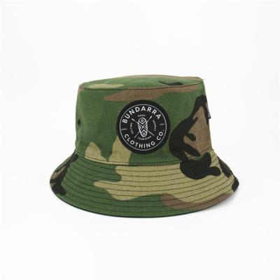 China Custom Picture Camouflage Reversible Bucket Hats With Custom Logo for sale