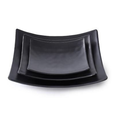 China Sustainable Hot sale unique wholesale kitchenware utensils melamine tableware black western food barbecue square upturned plate for sale