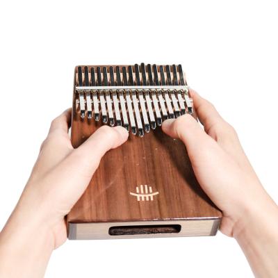 China Good GIF Pendant Accessory Kalimba 17 Main Kalimba (Walnut Marimba Mechanical Exquisite Musical Instrument Piano Thumb Finger Wooden Color) for sale