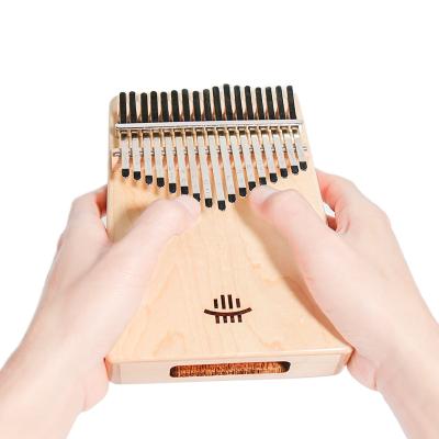 China GIF Pendant Kalimba 17 Main Kalimba (Maple) Marimba Piano Thumb Finger Accessory Mechanical Exquisite Good Musical Instrument for sale