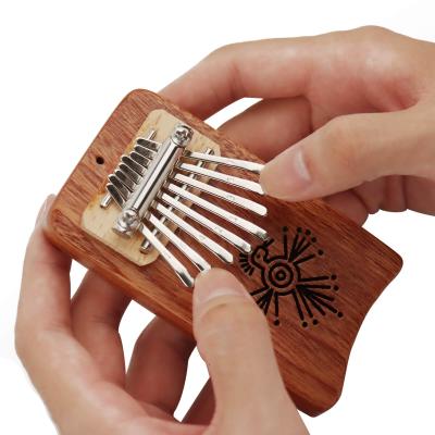 China Good GIF Accessory Kalimba 8 Mini Marimba Musical Exquisite Piano Thumb Finger Pendant Mini Kalimba 4.33 x 2.44 x 0.74 inch for sale