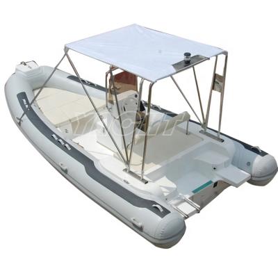 China Watersports 19ft/Orca/PVC Luxury RIB 550 Fiberglass Hull Hypalon Inflatable Boat With Sunbed for sale