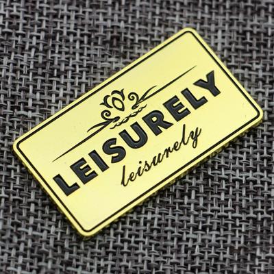 China Durable Garment Jeans Accessories Clothing Patch Bag Hat Shoe Scarves Embossed Custom Gold Metal Logo Tag Metal Bag Labels For Clothes for sale