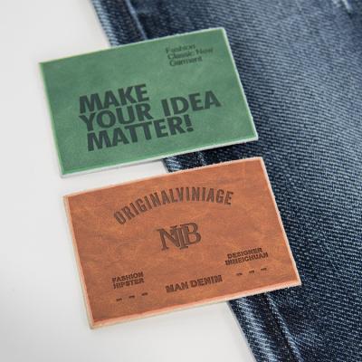 China Best Viable Price Brand Jeans Clothing Apparel PU Label Patch Embossed Custom Colored Leather Tags Leather Label Logo for sale