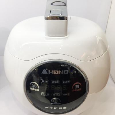 China 1.0L 500W Mini Indoor Ceramic Pot Fashion Non-stick Coating Portable Rice Cooker For Gift for sale