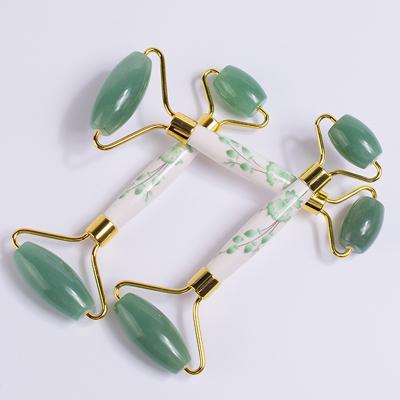 China 100% Natural Eco-friendly Crystal Jade Gua White Jade Roller Stone Face Massage Tool for sale