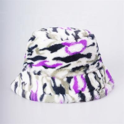 China Cold Dobby Women Winter Hats Printed Design Fur Bucket Hat for sale