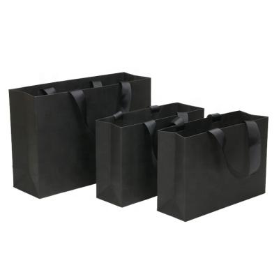 China MINGLI Logo Luxury Black Gift Paper Recyclable Wholesale Custom Jewelry Shopping Packaging Paper Bags With Ribbon Handles for sale