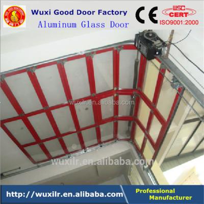 China Safety Rolling Automatic Aluminum Glass Sectional Door For Garage Car 4s Shop for sale