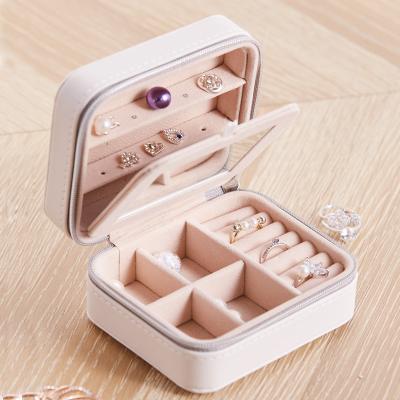 China Portable Mini Logo Gift Jewel Boxes Velvet Faux Leather Case Pink White Custom Jewelry Organizer Small Travel Jewelry Storage for sale