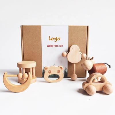 China Natural Eco-Friendly Ready To Ship Non-Toxic Beech Wood Chewing Teether Baby Animal Shape Organic Natural Newborn Gift Set Wooden Teether for sale