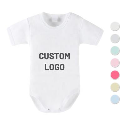 China Comfotable HAOTEX Customized Infant Overalls Clothes Solid Color Boy Girl Romper Sleepwear Newborn 100% Cotton Baby Pajamas Jumpsuits for sale