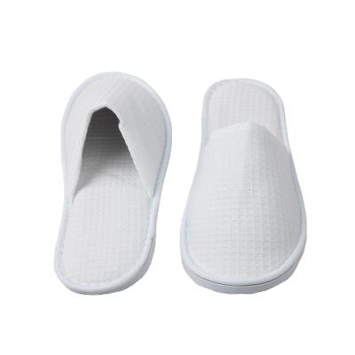 China Exquisite Disposable Hotel Amenities Personalized Customized Embroidery Hotel Disposable Slippers for sale