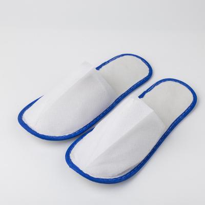 China Exquisite disposable hotel amenities customization of disposable slippers for hotels special anti slip thickened non-woven fabric beauty salons and home hospital for sale