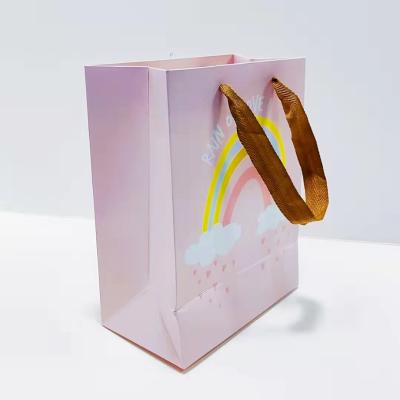 China Custom Recycled Materials Rainbow Fashion Gift Paper Bag Clothing Packaging Mall Gift Shopping Packaging Handbag for sale