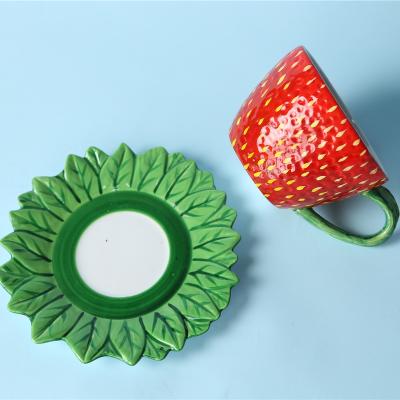 China Red Strawberry Cup And Saucer Hot Selling Red Ceramic Cute Sustainably Shape Beautiful for sale