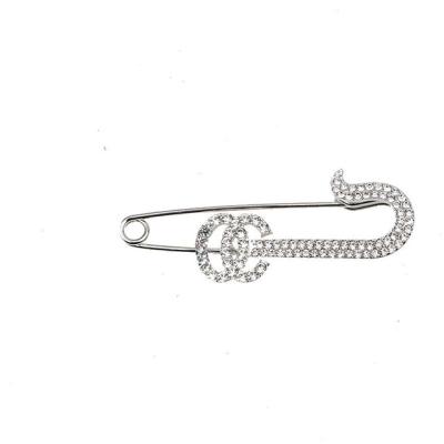 China Alloy simple and fashionable diamond pin for all seasonsDesigner famous brand brooch for sale