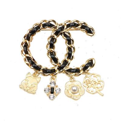 China Brass Korean Handmade Leather Making Chain Double C Brooch Classic Ladies Temperament Tassel Bodice All-match Female Jewelry for sale