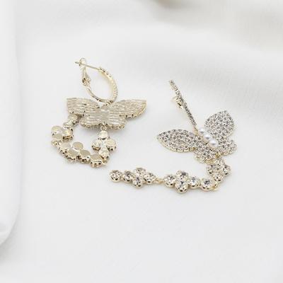 China Romantic Butterfly Earrings Long Curl Full Temperament Diamond Pearl Tassel Personality Earrings for sale