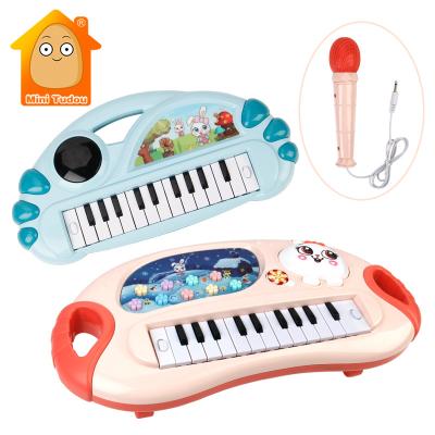 China Cartoon Battery Operated Flash Rabbit Toy Kids Electronic Piano Toy Keyboard Game Music Musical Microphone Equip Educational Toys For Children for sale