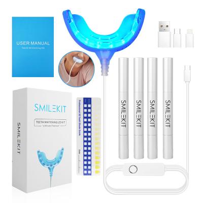 China Portable To Use Wholesale USB LED Light Teeth Whitening Kit With 4pcs Teeth Whitening Gels for sale