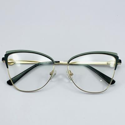 China Hot Selling Two Fashion Design Glass Frame Cat Eye Color Glass Female Metal Cat Eye Frame for sale